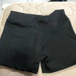 Shorts De Academia Feminina