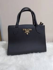 Lanamento Bolsa Prada